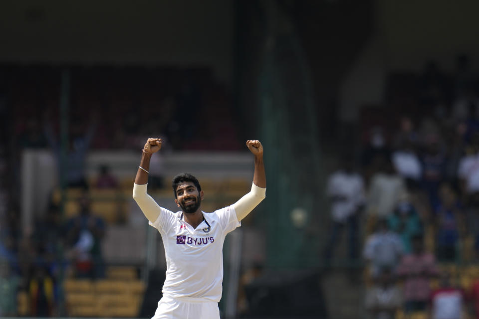 India's Jasprit Bumrah celebrates after taking his fifth wicket of Sri Lanka's Niroshan Dickwella during the second day of the second cricket test match between India and Sri Lanka in Bengaluru, India, Sunday, March 13, 2022. (AP Photo/Aijaz Rahi)