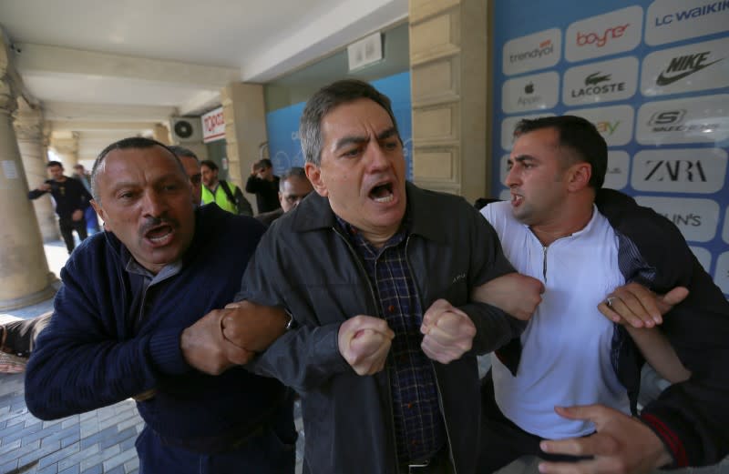 Opposition supporters hold a rally in Baku