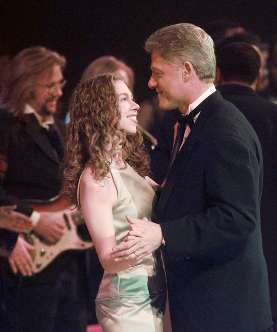 President Clinton and his daughter Chelsea dance at the Arkansas Inaugural Ball in celebration of the 53rd Presidential Inauguration Monday night, Jan. 20, 1997, in Washington. (AP Photo/Susan Walsh)