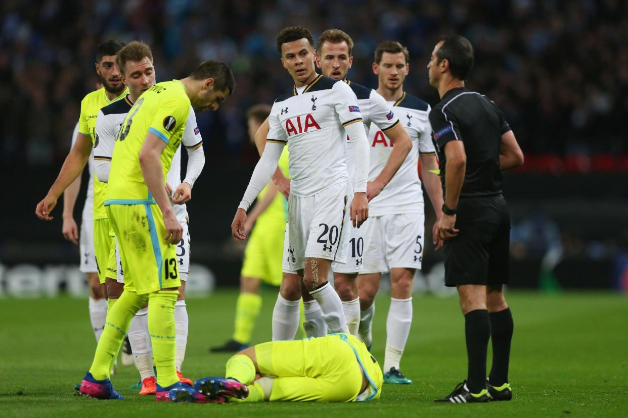 Seeing red: Alli was sent off for a rash challenge in Spurs' Europa League tie with Gent: Tottenham Hotspur FC via Getty Images