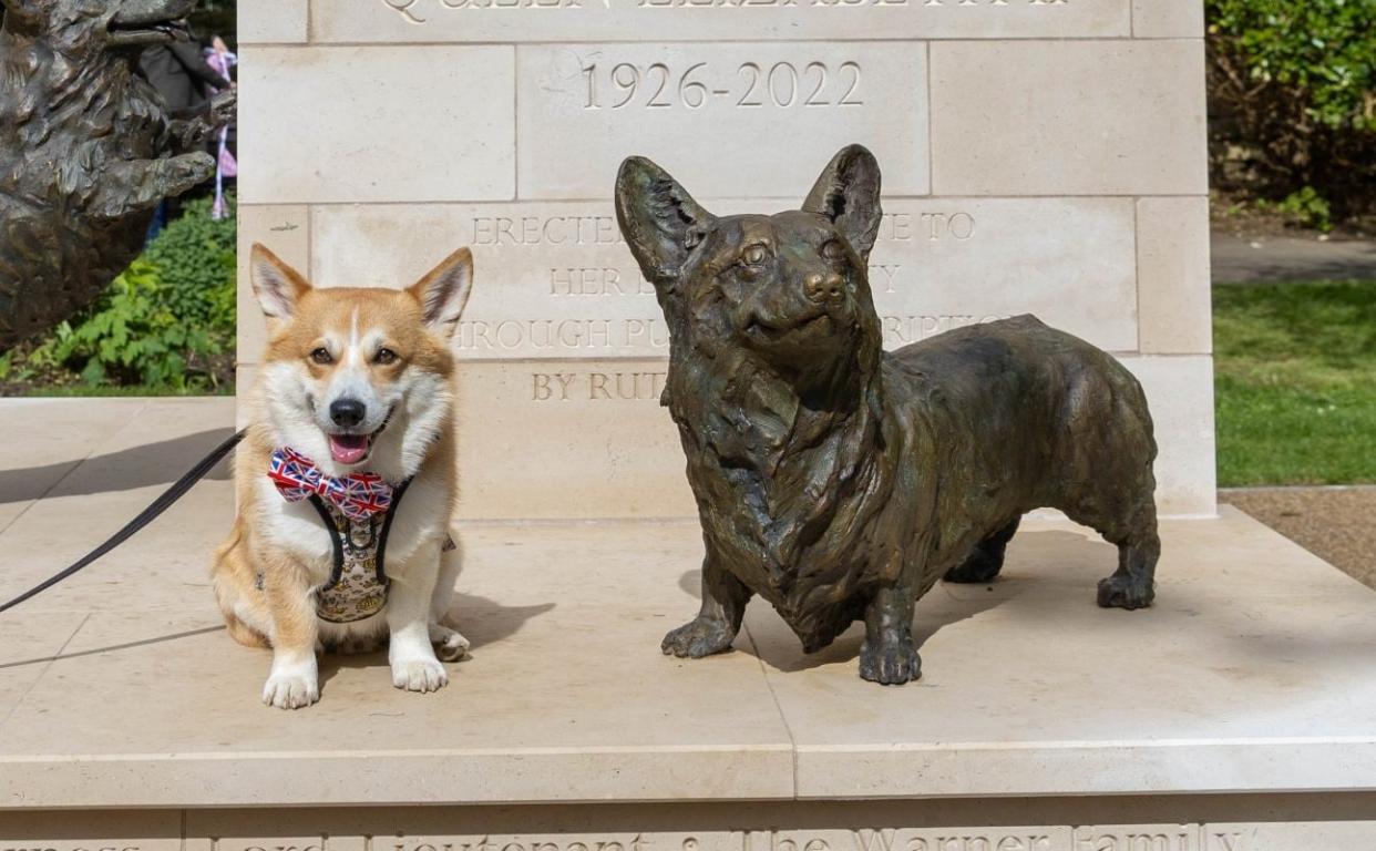 Three corgis feature on the statue