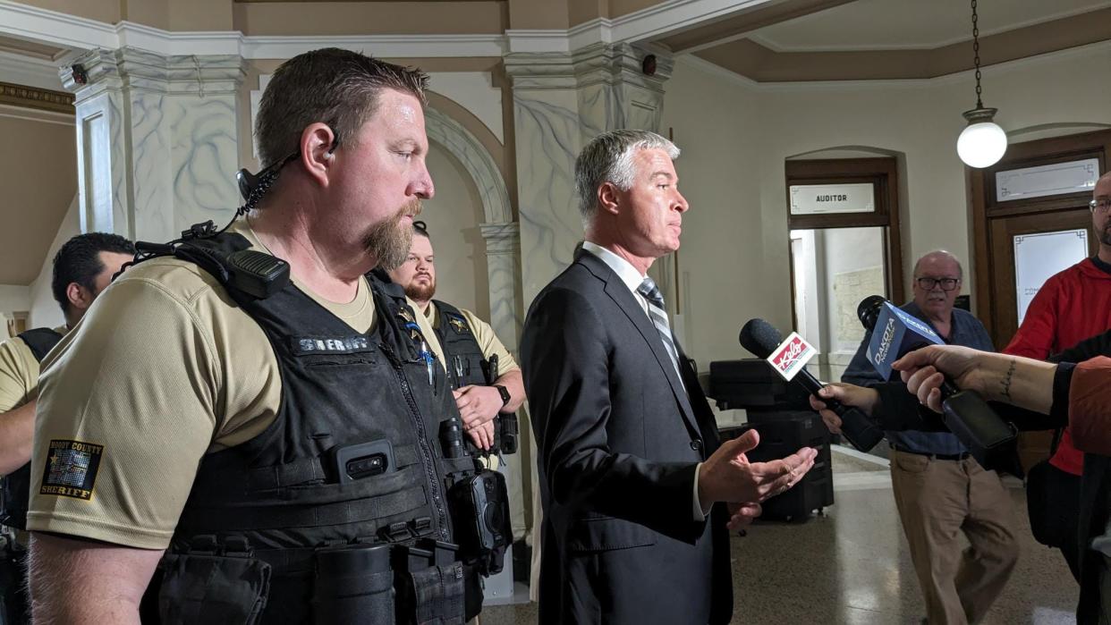 Attorney General Marty Jackley and Moody County Sheriff Troy Wellman speak to media members after Joseph Hoek court hearing 11 a.m. Wednesday March 13, 2024, at the Moody County Courthouse in Flandreau, South Dakota.