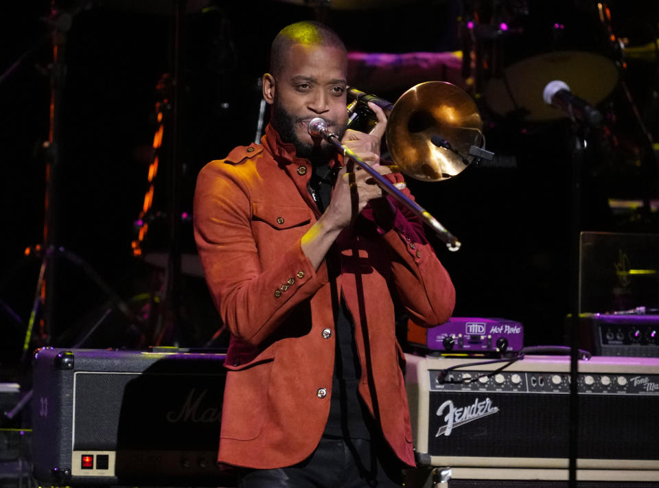 FILE - Trombone Shorty performs at the 8th annual Love Rocks NYC concert in New York on March 7, 2024. Trombone Shorty will perform at a Juneteenth concert celebrating Black History Month. (Photo by Charles Sykes/Invision/AP, File)