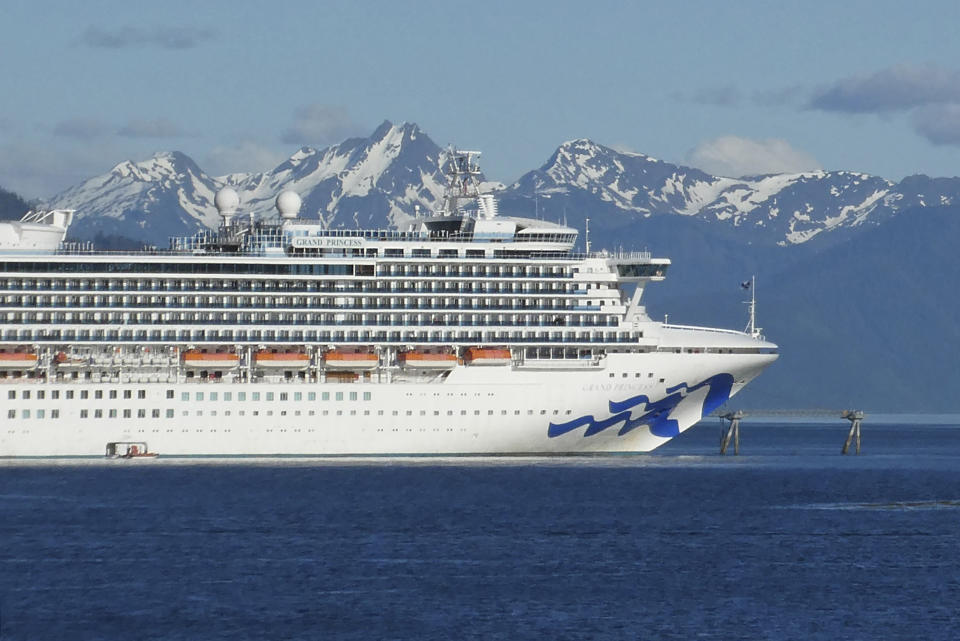 FILE - In this May 30, 2018, file photo, is the Grand Princess cruise ship in Gastineau Channel in Juneau, Alaska. The Canadian government has extended a ban on cruise ships through February 2022, which is expected to block trips from visiting Alaska this year. Transport Canada announced the extension of the ban put in place because of the COVID-19 pandemic. (AP Photo/Becky Bohrer, File)