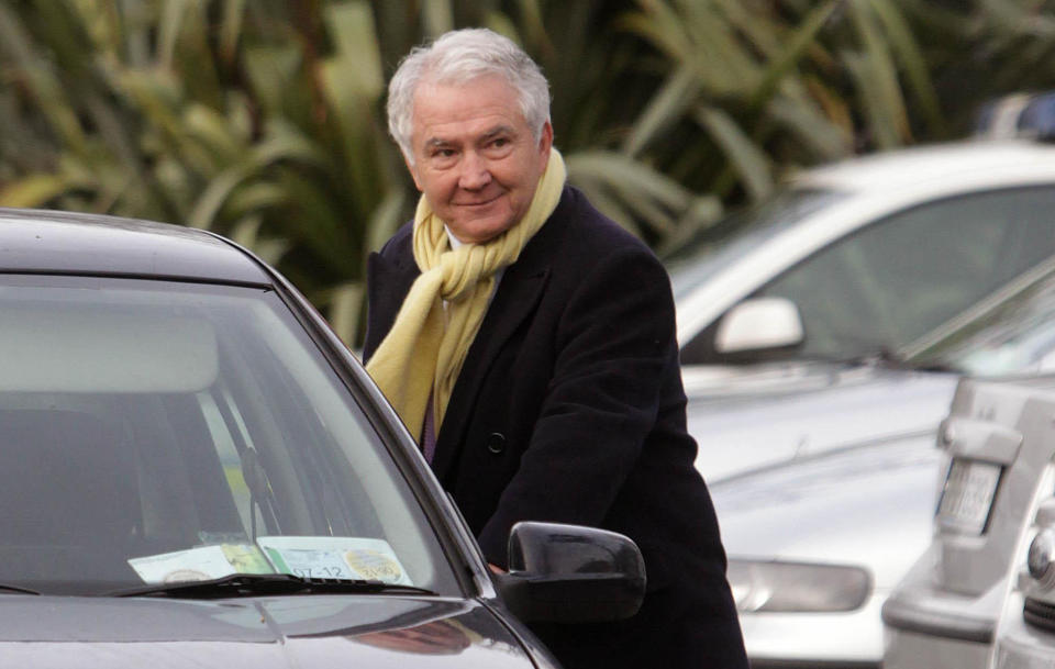 This photo of Dec. 10, 2011 shows former chairman of Anglo-Irish Bank Sean FitzPatrick in Dublin Ireland who has been arrested by fraud squad officers investigating financial irregularities. Irish police say fraud detectives have arrested the former chief executive of Anglo Irish Bank and charged him over a conspiracy to hide losses at the bank before its 2009 nationalization. Sean FitzPatrick was arrested Tuesday July 24, 2012 at Dublin Airport as he returned from a family holiday. (AP Photo/Niall Carson/PA Wire) UNITED KINGDOM OUT