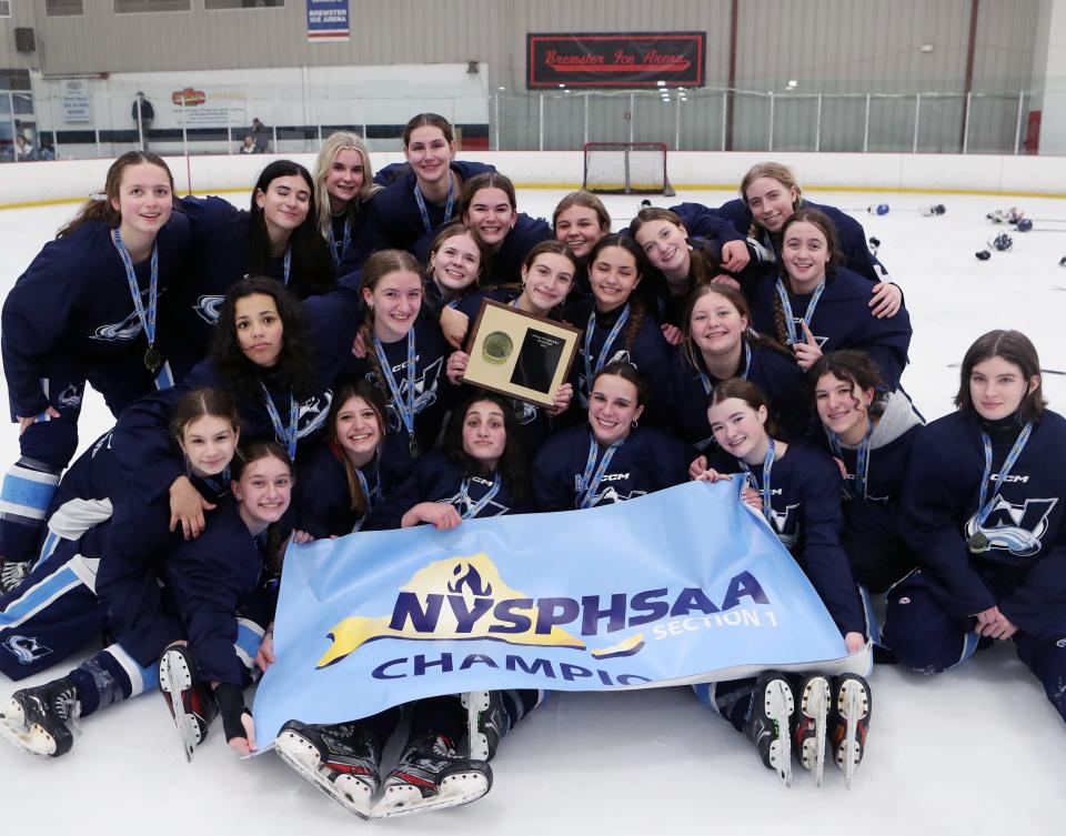 The North Avalanche celebrate after defeating the Rockland Rockies 4-0 in the Section 1 girls hockey championship at the Brewster Ice Arena Feb. 8, 2024. Feb. 7, 2024.