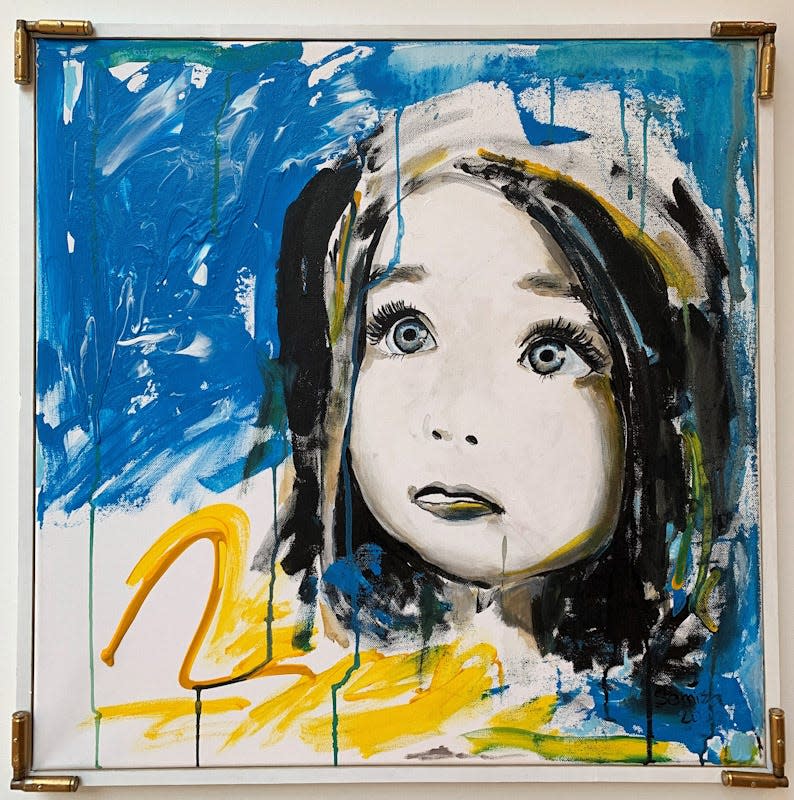 “Lost Childhood” by Mariupol-born Iryna Fedorenko is a centerpiece of the “We Stand with Ukraine” exhibit.