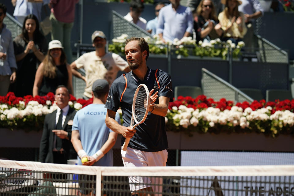 Daniil Medvedev applauds the crowd at the Madrid Open.