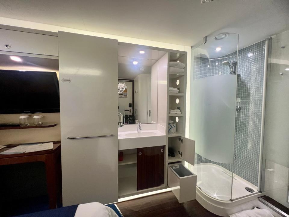 Norwegian Getaway bathroom corner with sink and glass shower