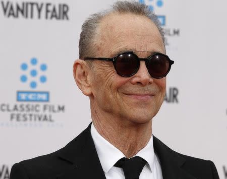 Cast member Joel Grey poses as he arrives at the world premiere of the 40th anniversary restoration of the film "Cabaret" during the opening night gala of the 2012 TCM Classic Film Festival in Hollywood, California April 12, 2012. REUTERS/Fred Prouser