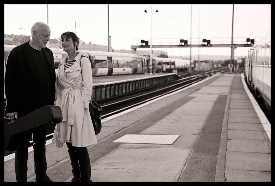 David Gilmour and Polly Sampson on a railway platform
