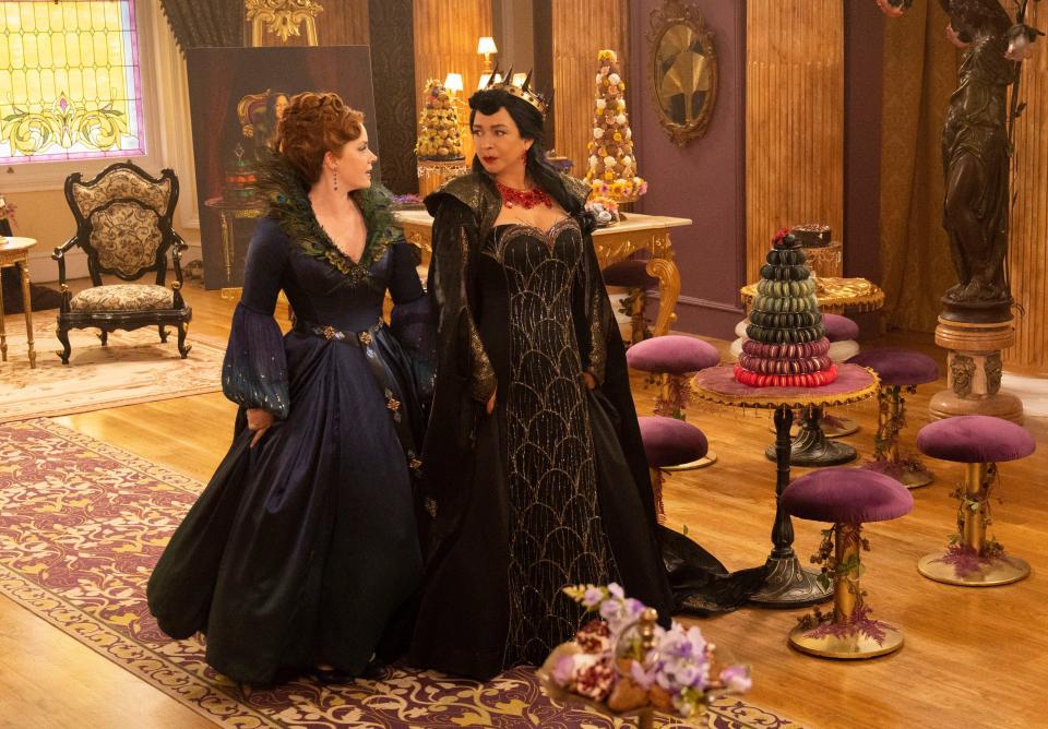 Giselle (Amy Adams, left) moves from the city to suburbia, fosters a new wicked side and runs afoul of local queen bee Malvina (Maya Rudolph) in "Disenchanted."