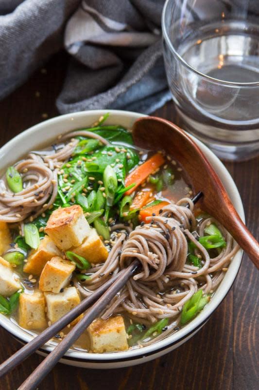 <p>Slurpable noodles, hearty tofu, and vibrant veggies go into this cozy soba noodle soup. Super cozy, absolutely meal-worthy, and ready to serve in under 30 minutes!</p><p><strong>Get the recipe: <a href="https://www.connoisseurusveg.com/soba-miso-tofu-soup/" rel="nofollow noopener" target="_blank" data-ylk="slk:Soba Miso Tofu Soup;elm:context_link;itc:0;sec:content-canvas" class="link rapid-noclick-resp"><em>Soba Miso Tofu Soup</em></a></strong></p>