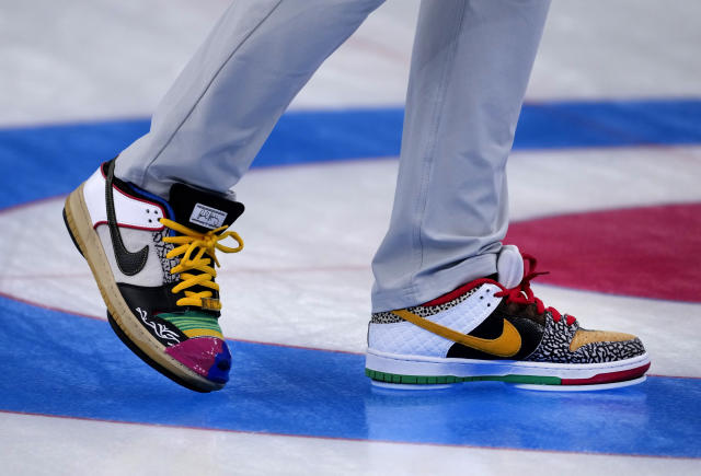 American curler Matt Hamilton's shoes stand out at Olympics