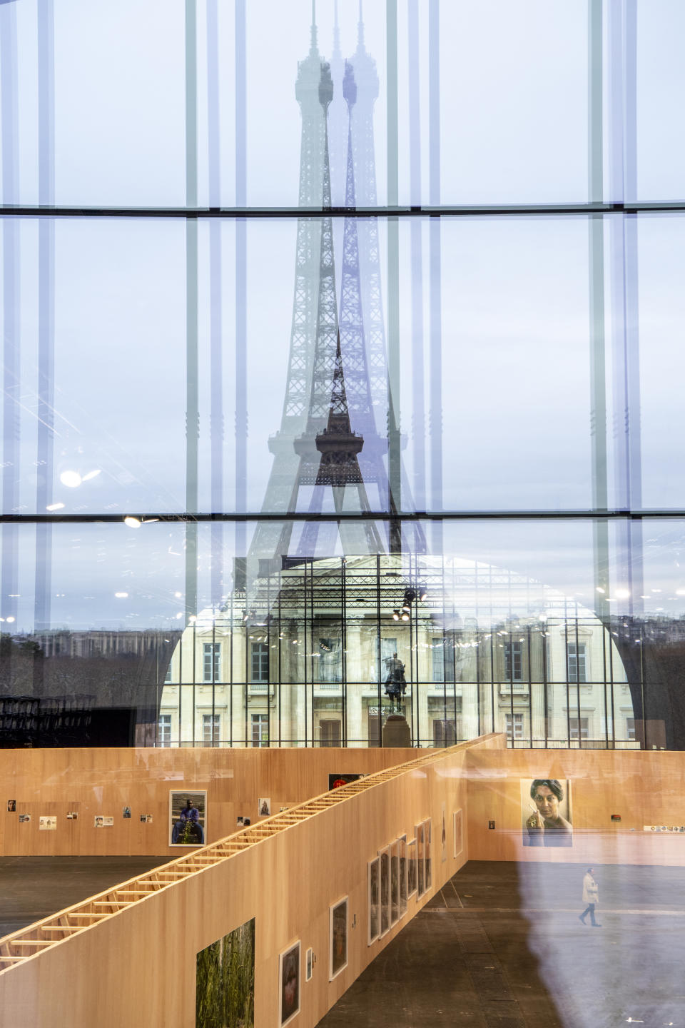 A view of the exhibition, with a large scale portrait of Dovile Drizyte.