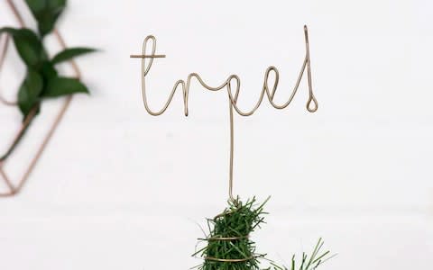 The Letter Loft Slogan Tree Topper - Credit: Not On The High Street