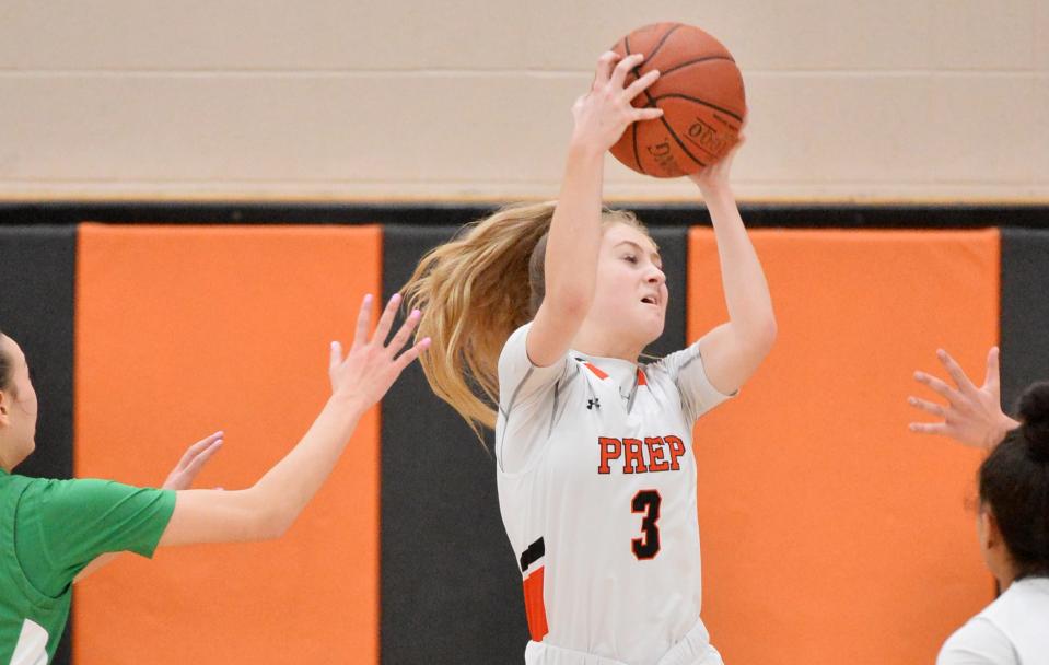 Cathedral Prep junior McKenna Valone grabs a defensive rebound against South Fayette.