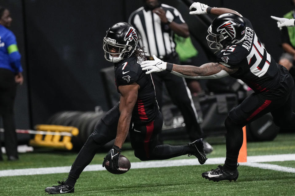 Atlanta Falcons running back Bijan Robinson (7) runs into the end zone for a touchdown against the Carolina Panthers during the first half of an NFL football game, Sunday, Sept. 10, 2023, in Atlanta. (AP Photo/John Bazemore)