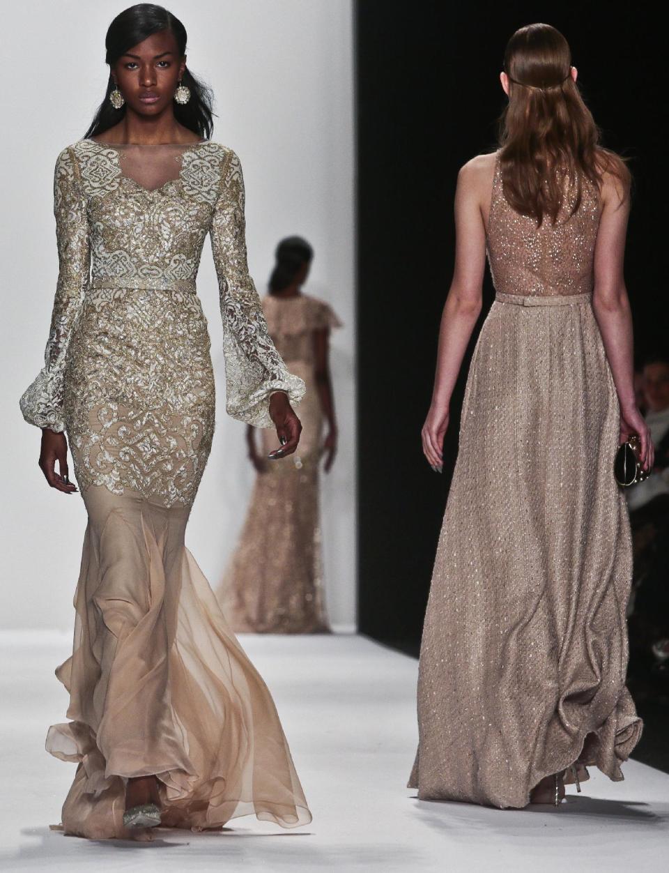 Fashion from the Badgley Mischka Fall 2014 collection is modeled during New York Fashion Week on Tuesday, Feb. 11, 2014. (AP Photo/Bebeto Matthews)