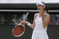 France's Alize Cornet is dejected after losing a point to Poland's Iga Swiatek during a third round women's singles match on day six of the Wimbledon tennis championships in London, Saturday, July 2, 2022. (AP Photo/Kirsty Wigglesworth)