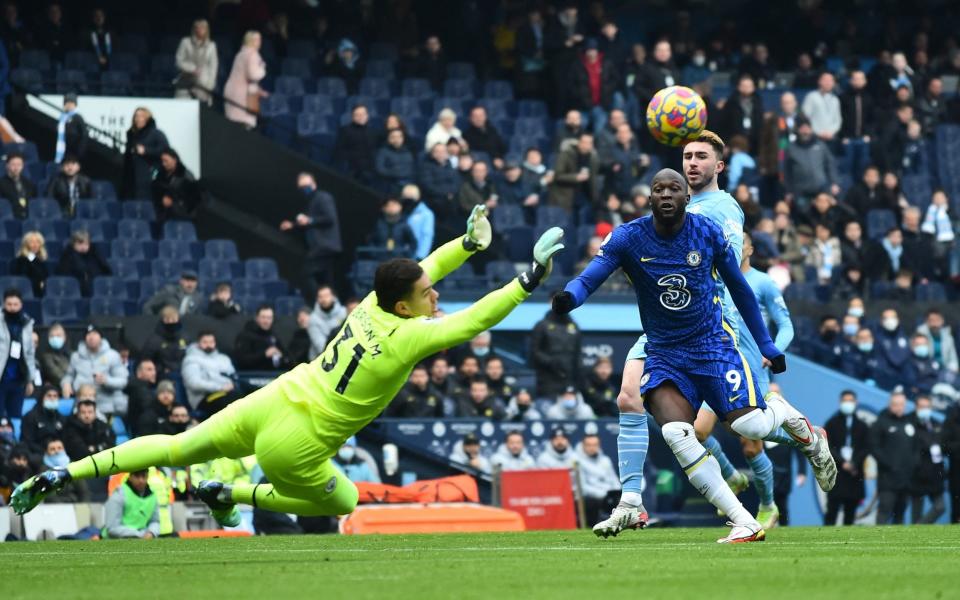 Ederson saves Lukaku's shot. - REUTERS/Peter Powell