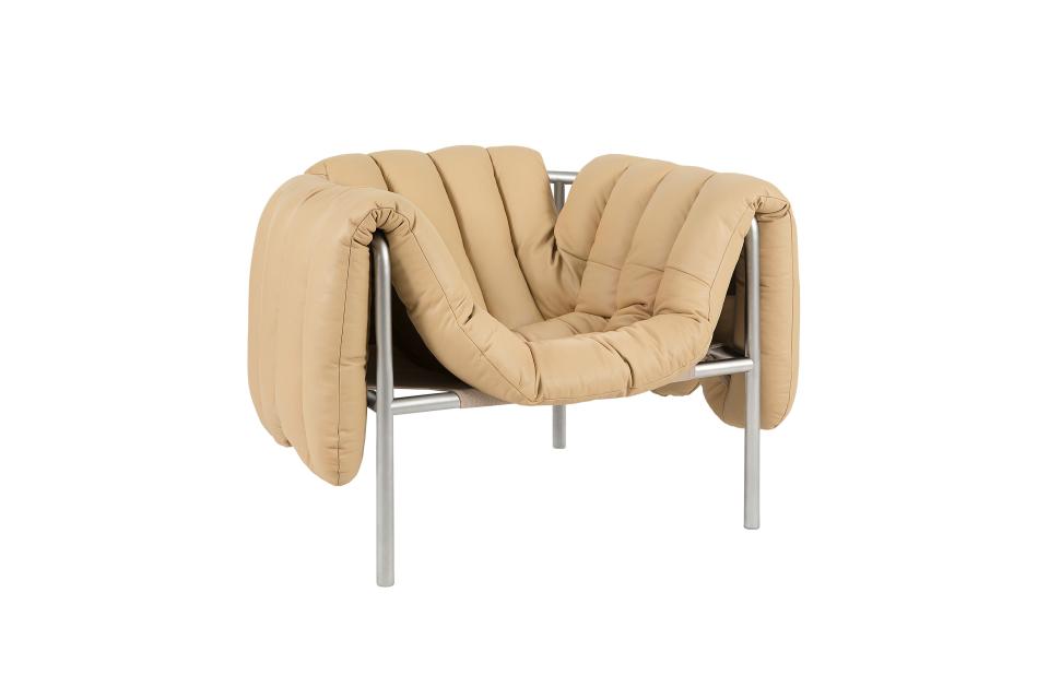 2020 :The Puffy Lounge Chair by Faye Toogood pairs a tubular steel frame with detachable upholstery.