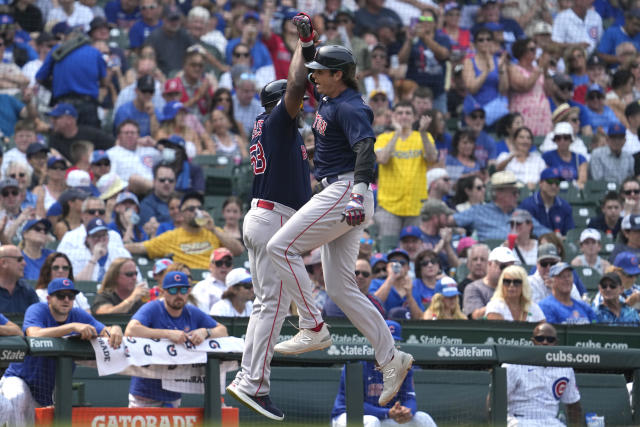 Yoshida hits a grand slam and drives in 6 as the Red Sox rout the Cubs 11-5  behind Crawford