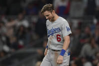 Los Angeles Dodgers' Trea Turner reacts after striking out in the seventh inning against the Atlanta Braves in Game 1 of baseball's National League Championship Series Saturday, Oct. 16, 2021, in Atlanta. (AP Photo/Brynn Anderson)