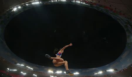 Katarina Johnson-Thompson of Britain competes in the women's long jump final during the 15th IAAF World Championships at the National Stadium in Beijing, China August 28, 2015. REUTERS/Phil Noble