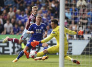 Leicester City's Harvey Barnes, center, scores during the English Premier League soccer match between Leicester City and West Ham United at King Power Stadium, Leicester, England, Sunday May 28, 2023. (Joe Giddens/PA via AP)