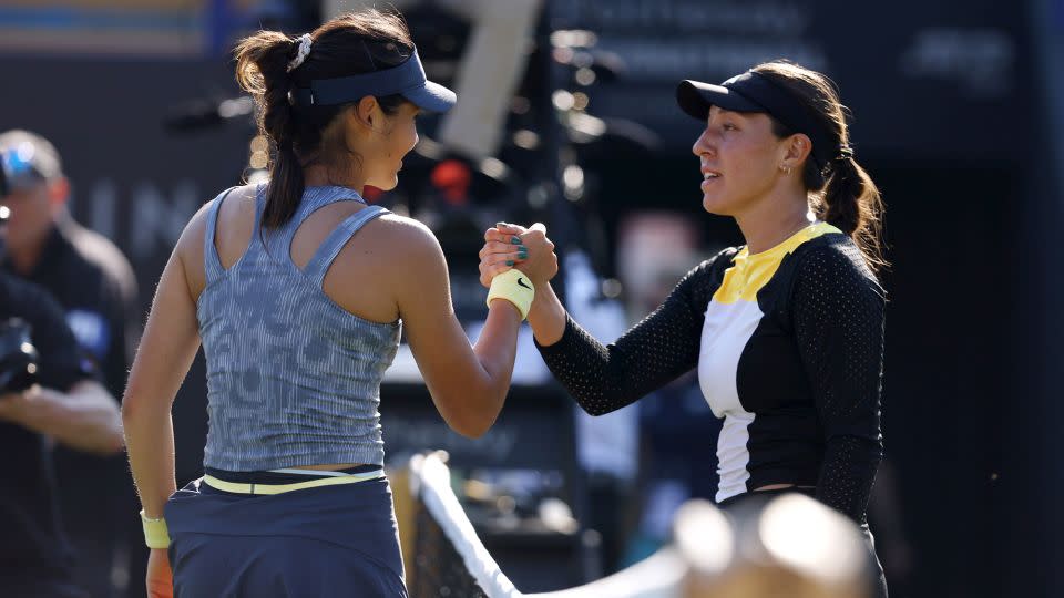 Raducanu and Pegula shake hands at the net. - Charlie Crowhurst/Getty Images