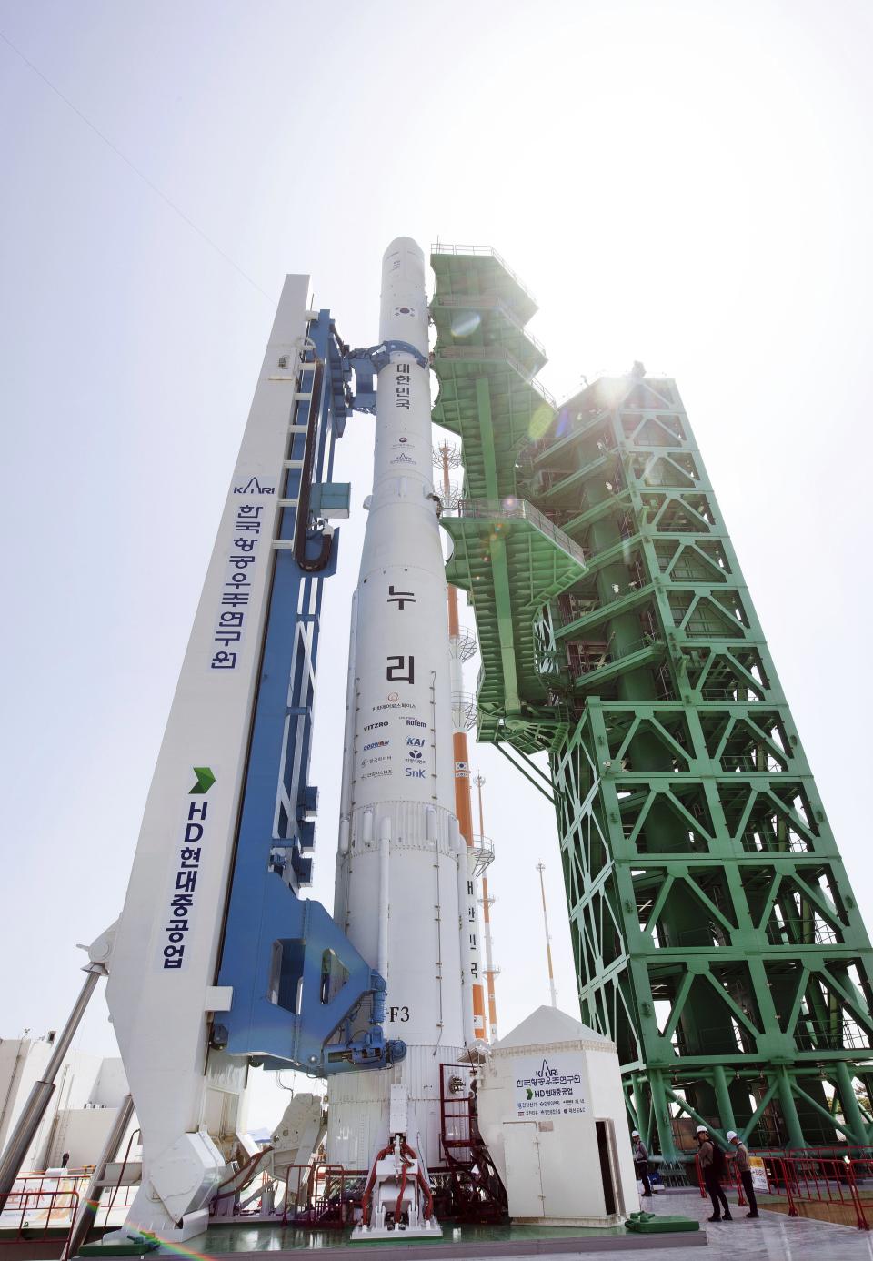 In this photo released by the Korea Aerospace Research Institute, the Nuri rocket sits on its launch pad at the Naro Space Center in Goheung, South Korea, Tuesday, May 23, 2023. South Korea was set to launch its first commercial-grade satellite, on Wednesday as rival North Korea(Korea Aerospace Research Institute via AP)