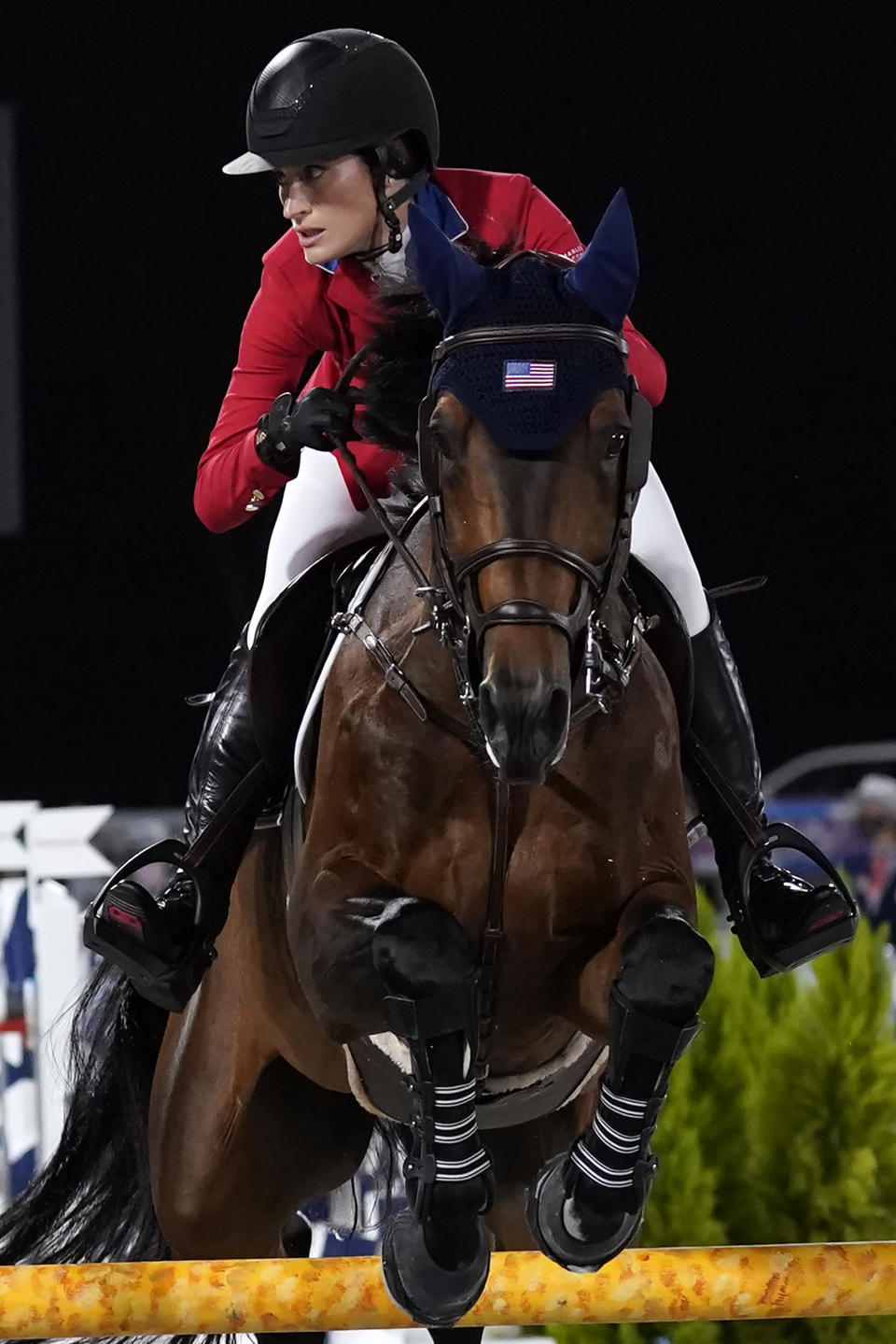 United States' Jessica Springsteen, riding Don Juan van de Donkhoeve, competes during the equestrian jumping individual qualifying at Equestrian Park in Tokyo at the 2020 Summer Olympics, Tuesday, Aug. 3, 2021, in Tokyo, Japan. (AP Photo/Carolyn Kaster)