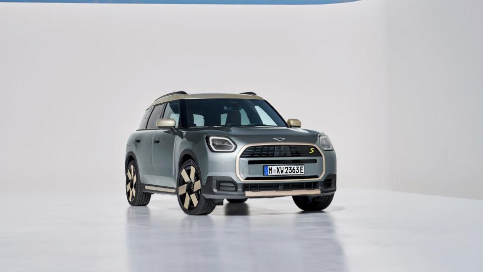 2025 mini cooper countryman electric in light blue with a cream and black interior