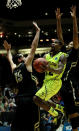 ALBUQUERQUE, NM - MARCH 17: A.J. Walton #22 of the Baylor Bears shoots against Shane Harris-Tunks #15 and Andre Roberson #21 of the Colorado Buffaloes in the first half during the third round of the 2012 NCAA Men's Basketball Tournament at The Pit on March 17, 2012 in Albuquerque, New Mexico. (Photo by Ronald Martinez/Getty Images)