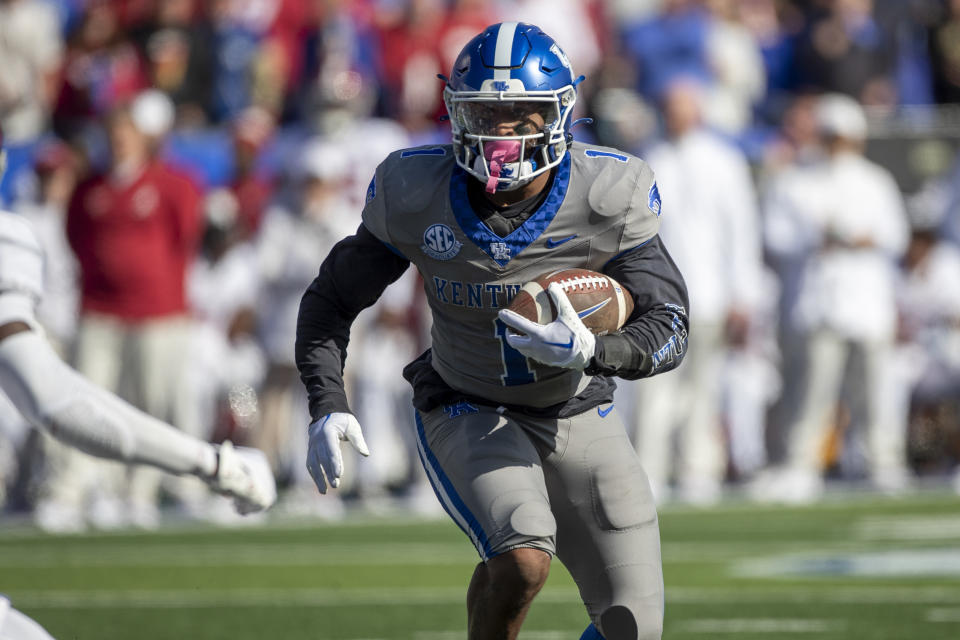 Kentucky running back Ray Davis (1) runs the ball during the first half of an NCAA college football game against Alabama in Lexington, Ky., Saturday, Nov. 11, 2023. (AP Photo/Michelle Haas Hutchins)