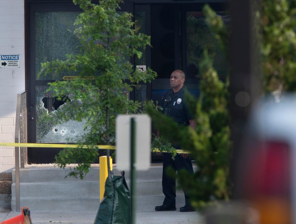 Metro Police investigate a shooting after an employee opened fire and shot three other employees at the Smile Direct Club warehouse Tuesday, Aug. 3, 2021 in Nashville, Tenn. 