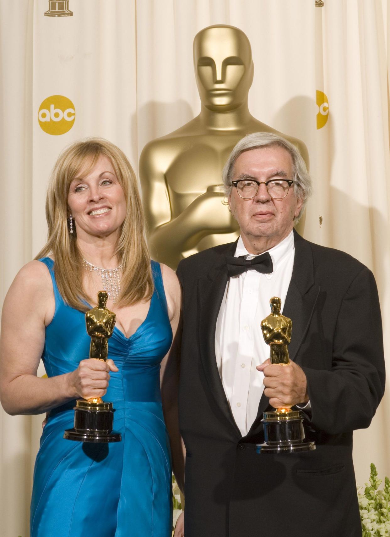 Best Adapted Screenplay winners Diana Ossana and Larry McMurtry are seeb backstage during the 78th Annual Academy Awards at the Kodak Theatre in Hollywood on March 5, 2006. 