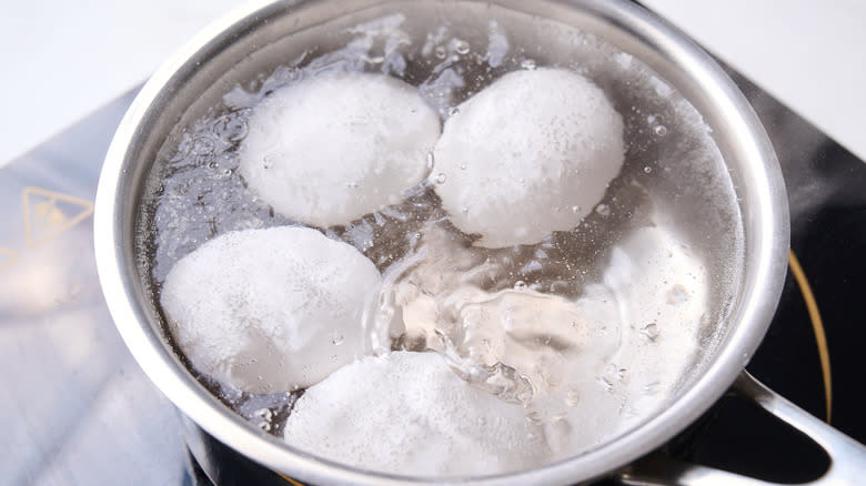 boiling eggs in pot