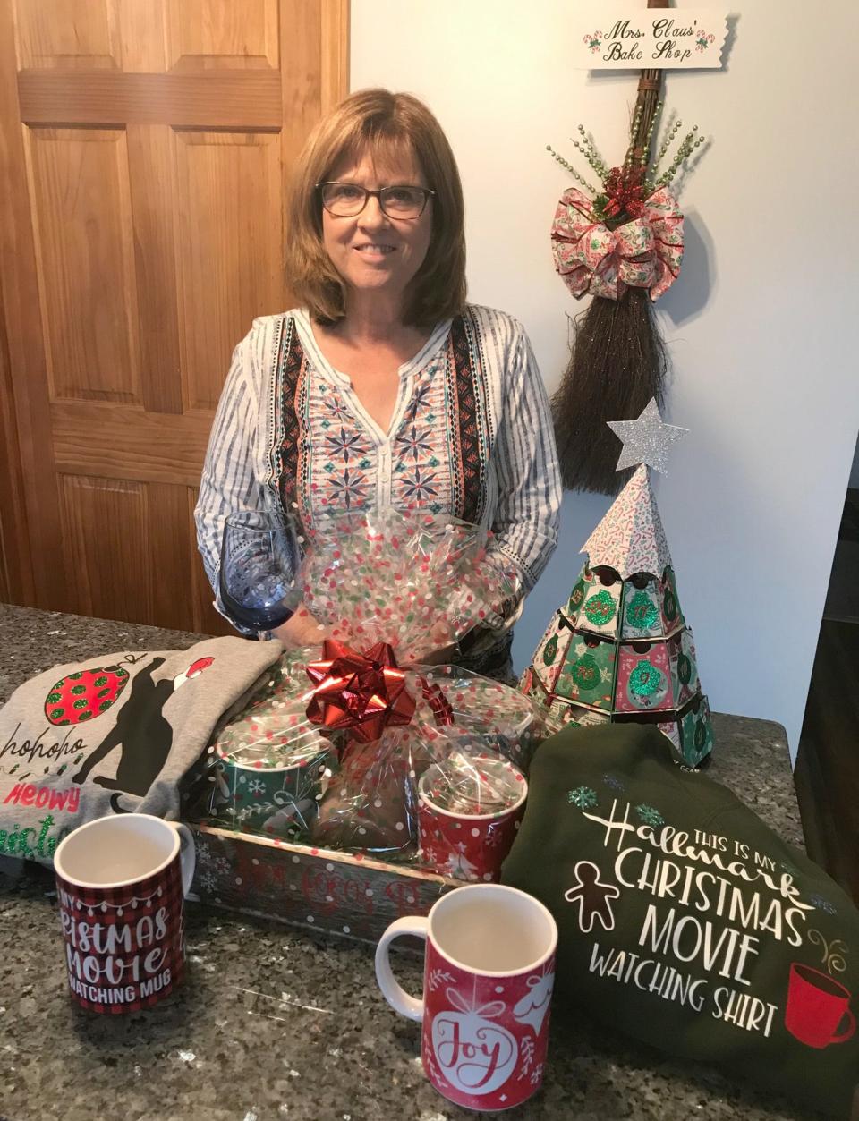 Robin Clancy displays some of her favorite holiday gift crafts Nov. 25 at her home workshop in Verona.