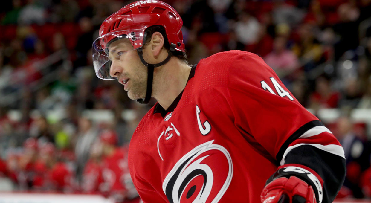 RALEIGH, NC - FEBRUARY 16: Justin Williams #14 of the Carolina Hurricanes skates for position on the ice during an NHL game against the Dallas Stars on February 16, 2019 at PNC Arena in Raleigh, North Carolina. (Photo by Gregg Forwerck/NHLI via Getty Images) 