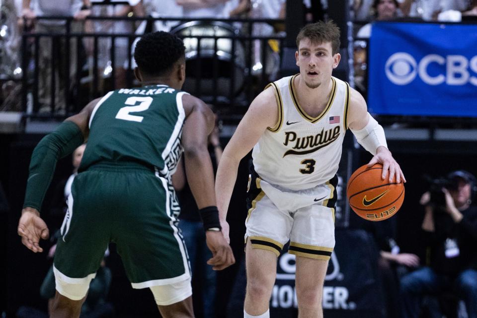 Purdue guard Braden Smith dribbles the ball while Michigan State guard Tyson Walker defends in the second half of MSU's 77-61 loss on Sunday, Jan. 29, 2023, in West Lafayette, Indiana.