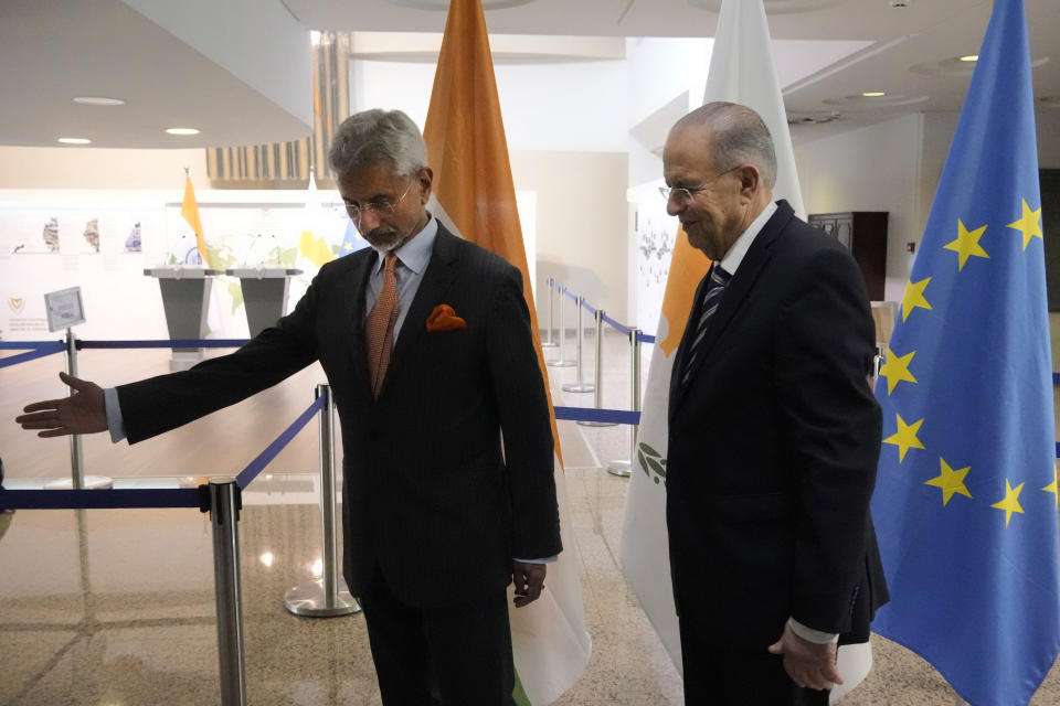 Cyprus' foreign minister Ioannis Kasoulides, right, and his Indian counterpart Subrahmanyam Jaishankar meet at the foreign house in capital Nicosia, Cyprus, Thursday, Dec. 29, 2022. Jaishankar is in Cyprus for a two-day official visit. (AP Photo/Petros Karadjias)