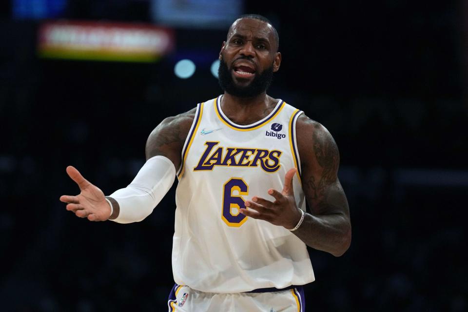 Lakers forward LeBron James reacts against the Pistons in the first half on Sunday, Nov. 28, 2021, in Los Angeles.