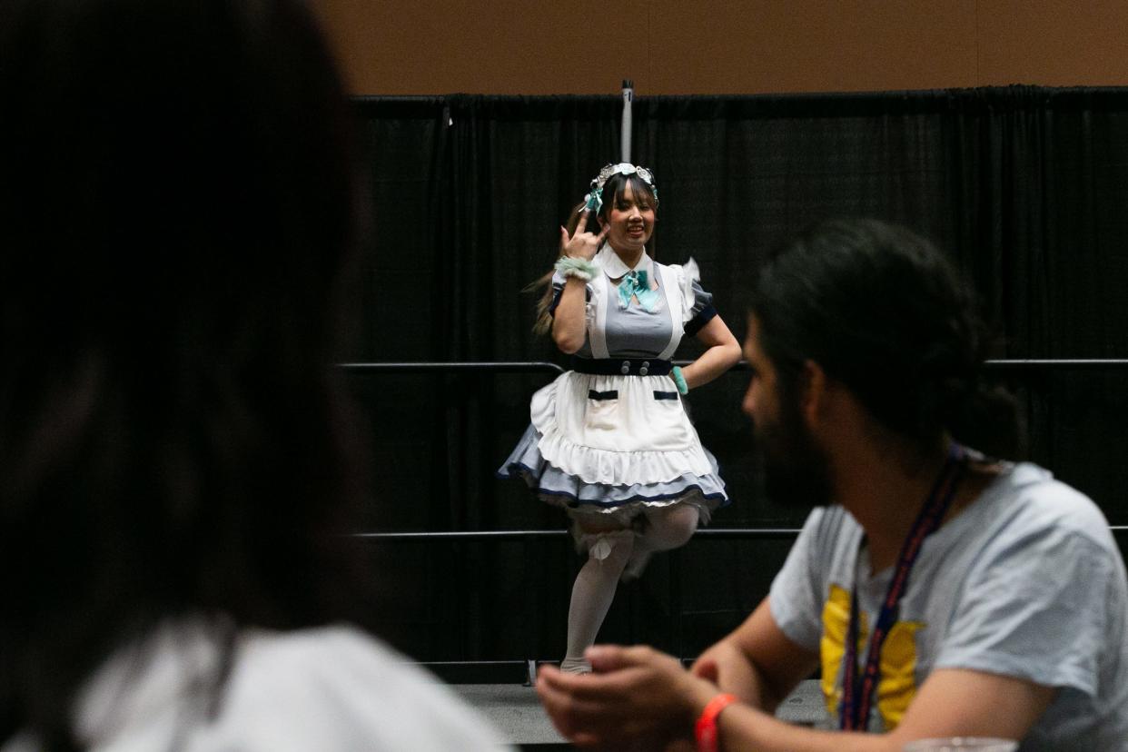 Yui of Megami Maids, a Houston-based maid cafe grorup, performs for an audience at the inaugural Anime Corpus Christi expo at American Bank Center Friday, Feb. 24, 2023.