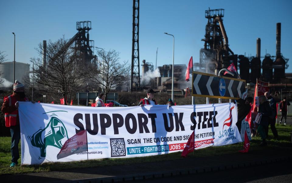 Protesters outside the Port Talbot steelworks are protesting against plans to close both blast furnaces