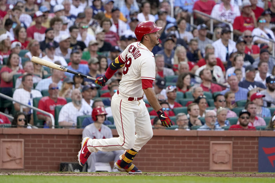 St. Louis Cardinals' Nolan Arenado follows through on an RBI single during the first inning of a baseball game against the New York Yankees Saturday, Aug. 6, 2022, in St. Louis. (AP Photo/Jeff Roberson)