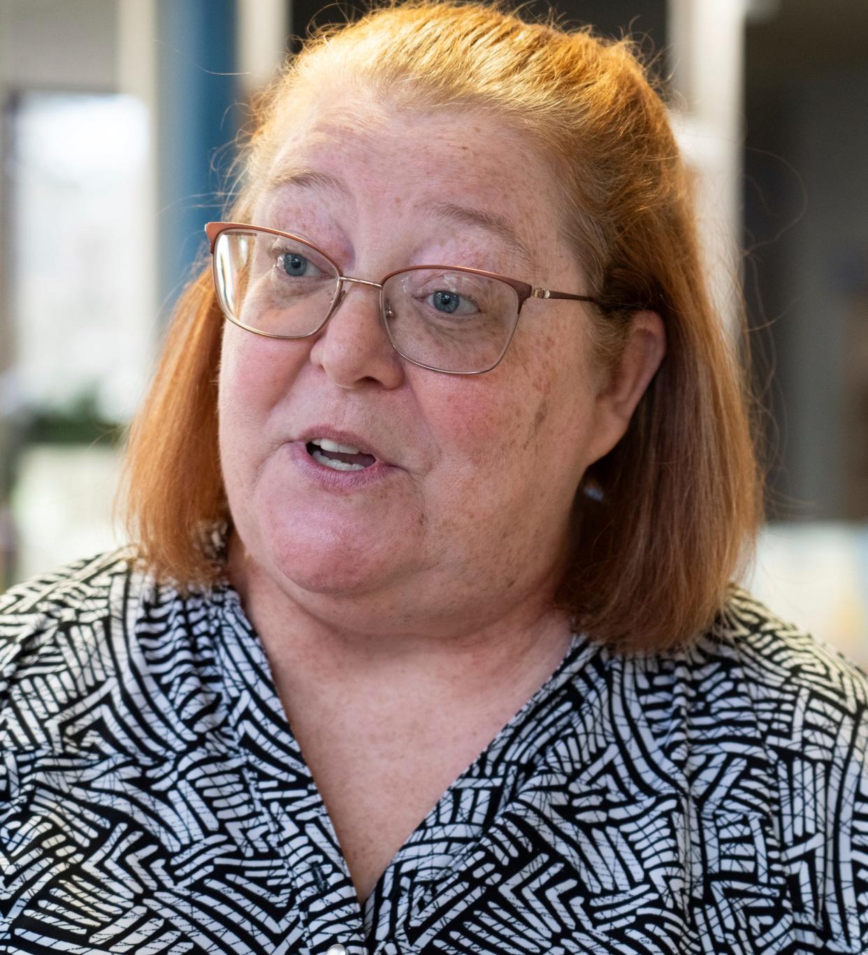 United Teachers of Flint President Karen Christian talks with a reporter following a press conference at the Accelerated Learning Academy in Flint on Wednesday, April 10, 2024.