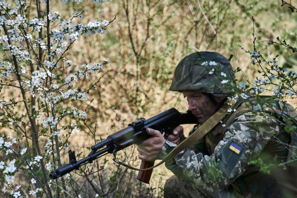 Troops with Ukraine's Da Vinci Wolves battalion train for assaults on April 8. - Copyright: Kostiantyn Liberov/Libkos/Getty Images