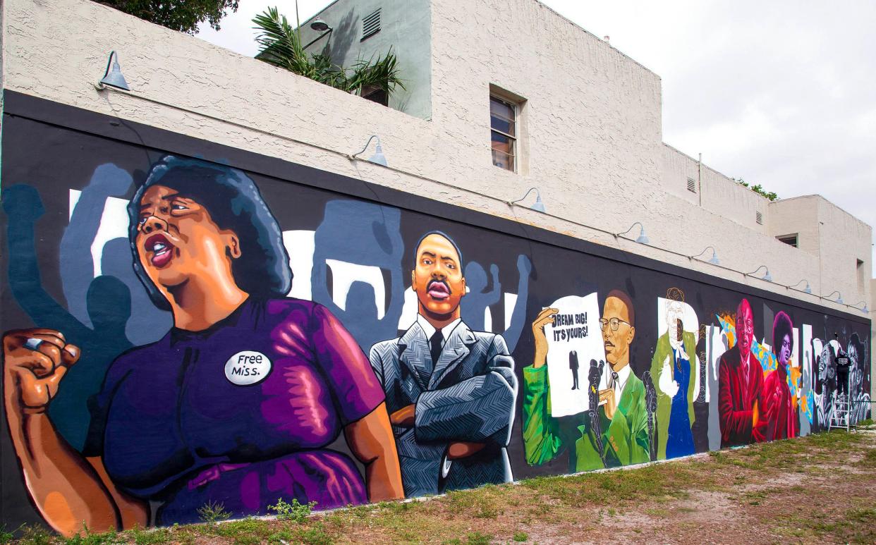 A mural on the Respectable Steet wall at 518 Clematis Street in downtown West Palm Beach shows the history of the civil rights movement in portraits and quotes. The mural is a collaboration between Street Art Revolution artists Dahlia Perryman, Eduardo Mendieta, Tracy Guiteau, and Nate Dee.